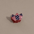 Detail of USA flag pattern hair claw clip with red glitter stars and stripes design - Rocket Style Red Base