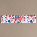 Flat lay detail of American flag headband with patriotic red and blue floral print pattern - Floral Flag