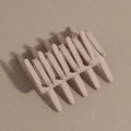 Detailed macro view of large matte nude resin hair claw clip with sturdy rectangular hollow design - Khaki
