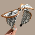 Bohemian paisley print headband with elegant bow design and brown satin edge trim - Yellow