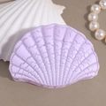 Detailed view of lavender seashell hair claw with unique crackle texture and gloss finish - Purple Large Shell