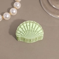 Close-up of mint green shell hair claw clip with vintage crackle texture for women - Green Small Shell