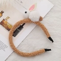 Detail of cute white plush bunny with pink ears on a brown sherpa hairband accessory - Khaki