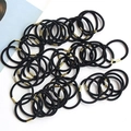 Bulk pack of high-elastic black hair ties with gold metal connectors on a clean background - Metal Interface Style (50 Count)
