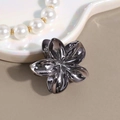 Elegante molletta per capelli a fiore in metallo con finitura gunmetal lucida - Canna di Fucile Piccolo