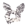 Bunny ear scrunchie with classic black and white paisley floral print on plain background - White Floral Print