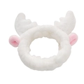 Detailed view of plush white deer antler headband with soft pink coral fleece texture - White Deer Horn