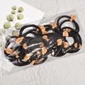 Pack of seamless black high elasticity hair ties in clear packaging with paper label - Black