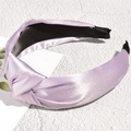 Detail view of the lavender satin knotted headband with smooth glossy fabric texture - Taro Purple