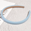 Detail showing light blue fabric headband with soft sponge padding and non-slip lining - Sky Blue (1.2cm)