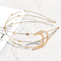 Golden multi-layer headband featuring moon stars and pearl accents on a stone background - Moon Gold