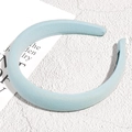 Detailed view of light blue padded sponge headband with fine diagonal twill fabric texture - Sky Blue