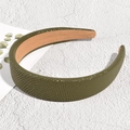 Detail of olive green pebble grain leather headband on a minimalist white background - Army Green