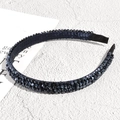 Macro shot of dark blue rhinestone headband showing crystal texture and satin lining - Fine Sparkling Style / Navy Blue