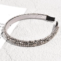 Close-up of sparkling silver rhinestone headband with detailed crystal embellishment - Fine Sparkling Style / Silver
