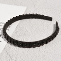 Close-up of black beaded headband with faceted stones and comfortable fabric end covers - Vintage Beaded Style / Black