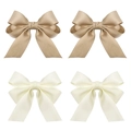 Detail of four-piece ribbon bow hair clips in champagne gold and off-white satin - Four-Piece Set