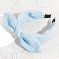 Detail of light blue striped chiffon bow headband with non-slip fabric ends - Blue