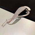 Elegant silver banana hair clip with sparkling rhinestones and a curved cross design - Silver