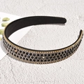 Close-up of black wide headband with rows of sparkling rhinestones and crystal beads - Wide Rhinestone Black