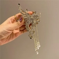 Detail of golden butterfly hair claw with sparkling rhinestones and pearl tassels - Gold Rhinestone