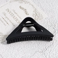 Detail of matte black triangular hair claw clip with strong spring and tight teeth - Matte Black