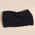 Detail view of black cable knit headband showing ribbed texture and stylish knot design - Black