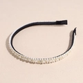 Detalle de una elegante diadema negra con cuentas transparentes e hilos dorados metálicos - Blanco con Diamantes de Imitación