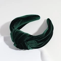 Detail of the emerald green velvet knotted headband texture and twisted fabric design - Dark Green