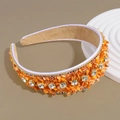 Detalle de diadema barroca naranja con pedrería y fragmentos de turquesa resplandeciente - Naranja