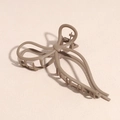Detail of matte khaki bow hair claw clip showing frosted texture and metallic spring - Coffee Bow Hair Claw Clip