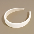Detail of minimalist wide matte PU leather headband with non-slip velvet inner lining - White
