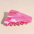 Detail showing the pink and white striped marble texture of the acetate hair claw clip - Rose Red Triangle