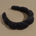 Detail of black thick terry cloth headband featuring a wavy sponge padded cloud design - Black