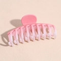 Detail shot of the matte gradient pink acrylic hair claw clip with multi-tooth grip - Keel Style Claw