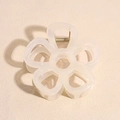 Detail view of a cream white flower hair claw clip with a strong gold metal spring mechanism - Translucent Off-white