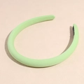 Cerchietto imbottito verde chiaro con trama in tessuto diagonale e design minimalista - Verde chiaro