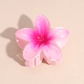 Macro view of pink gradient resin flower hair claw with durable teeth for styling - Rose Red