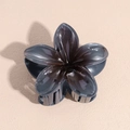 Detail shot of translucent gray flower hair claw clip with smooth resin finish - Gray
