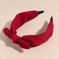 Detail of dark red chiffon bow headband showing fabric texture and comfort end tips - Red