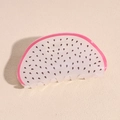 Macro view of pitaya dragon fruit hair claw clip with detailed black seed patterns - Dragon Fruit