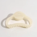 Minimalist creamy white acetate claw clip with a glossy finish and smooth curved design - Irregular Oval Light Yellow
