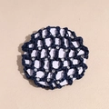 Detailed view of dark blue woven hair net featuring sparkling rhinestone accents on mesh - Navy Blue