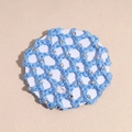 Detail of light blue mesh hairnet with small sparkling rhinestones on a card base - Blue