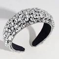 Macro detail of the silver luxury headband featuring shimmering crystals and black velvet lining - Wide White
