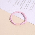 Detailed view of pink braided elastic hair tie with a smooth matching connector - Pink