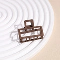 Macro shot of minimalist matte coffee brown rectangular hair claw clip with spring detail - Square Dark Coffee