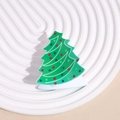 Dettaglio della molletta per capelli a forma di albero di Natale su vassoio bianco - Albero di Natale