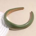 Macro detail of the olive green faux leather headband with non-slip inner lining - Green