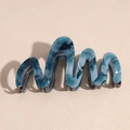 Detail of blue marble texture acetate hair claw clip with wave design and metal spring - Dark Blue
